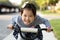 Cute little girl learning ride a bicycle with no helmet