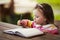 Cute little girl learning to write