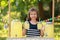 Cute little girl at lemonade stand. Summer refreshing natural drink