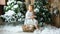 Cute little girl in a light dress sits on a stump among artificial fir trees and artificial snow with a wicker basket with toys.