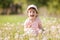 Cute little girl play in the park. Beauty nature scene