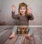 Cute little girl playing drum