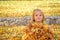 Cute Little Girl Playing Golden Autumn Leaves