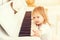 Cute little girl playing piano at a music school. Preschool child learning to play music instrument. Education, skills concept. Li
