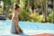 Cute little girl on the poolside