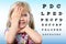 Cute little girl reviewing eyesight.