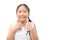 Cute little  girl is smiling cheerful showing and pointing with fingers teeth and mouth