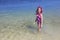Cute little girl snorkeling in the ocean