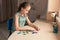 Cute little girl solving puzzle together