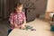 Cute little girl solving puzzle together