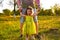 Cute little girl take hands with her father. Walking with kids concept image. Little girl holding hands with her parents. Smiling