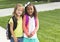 Cute Little girls walking to school together