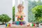 Cute little kid boy with playing with lots of colorful plastic blocks indoor. Active child having fun with building and creating o
