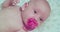 cute little newborn baby.portrait of toddler who looking at camera in surprise