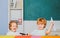 Cute little preschool kid boy study in a classroom. Educational process. Elementary school and education. Funny toddlers