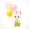 Cute little rabbit in a green jumpsuit with polka dots holding balloons in the paws