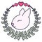 Cute and little rabbit with wreath and hearts