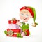 Cute little Santa`s elf sit and puts boxes with gifts