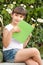 Cute Little School Girl Reading Book