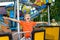 Cute little smiling boy riding a Carnival Carousel