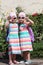 Cute little twin girls making V-signs