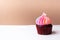 Cute little white heart on rainbow cream cupcake, sweet dessert concept