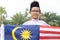 Cute Malay boy with the Flag of Malaysia