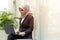 Cute Malay Woman wearing hijab outdoor executive