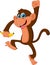 Cute monkey standing and holding a banana