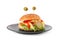 Cute monster burger isolated on white. Halloween party food