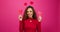 Cute multi-ethnic woman poses with paper hearts, symbol of love studio Valentine