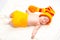 A cute newborn baby girl sleeping. Sweet little baby portrait. Use the photo to represent life, parenting or childhood