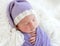 Cute newborn in knitted hat