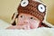 Cute newborn wearing funny hat