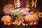 A cute newborn in a wreath of berries and fruits sleeps in a basket. Autumn harvest.