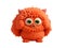 Cute orange furry monster on a transparent background