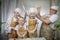 Cute oriental family with mother, father, daughter, son cooking in the kitchen on Ramadan, Kurban-Bairam, Eid al-Adha