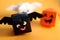 Cute origami Halloween haunted pumpkin, bat and ghost