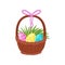 Cute painted Easter eggs and green grass in basket pink bow. Spring holiday. Religious symbol. Flat vector design