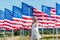 Cute patriotic child standing in white dress