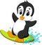 Cute penguin surfing cartoon