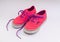 Cute pink kids shoes with purple laces , side view