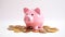 A cute pink piggybank sitting on gold coins money concept AI generated