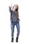 Cute playful young charming woman in gray jumper pointing finger showing you.