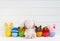 Cute plush bunny doll with colorful Easter eggs with crochet Easter egg cups top in various shapes of bunnies, frog, teddy
