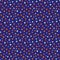 Cute polka dots seamless vector pattern background. Random neon orange blue indigo dot shapes on navy blue backdrop