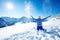 Cute portrait of a girl throw snow in air over sky