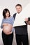 Cute Pregnant Woman and Man with Arrow Sign