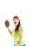 Cute pretty girl in green shirt throws brown rugby ball towards