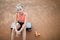 A cute, pretty teenage girl sits on a step platform and relaxes after her workout on outdoor